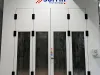 Wet coating booth with closed doors