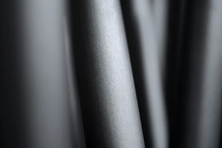 Steel cartridge surface after blasting close-up