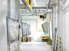 Overhead manual conveyor with loading station
