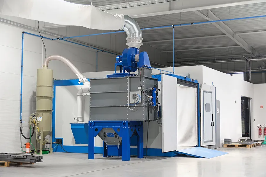 Compact blasting booth with filtration open doors