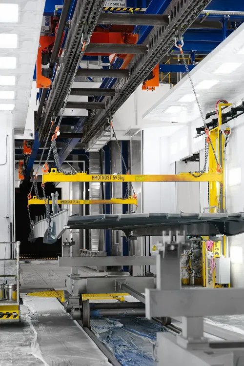 Overhead freight wagon conveyor