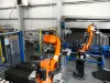 Robotic unloading station