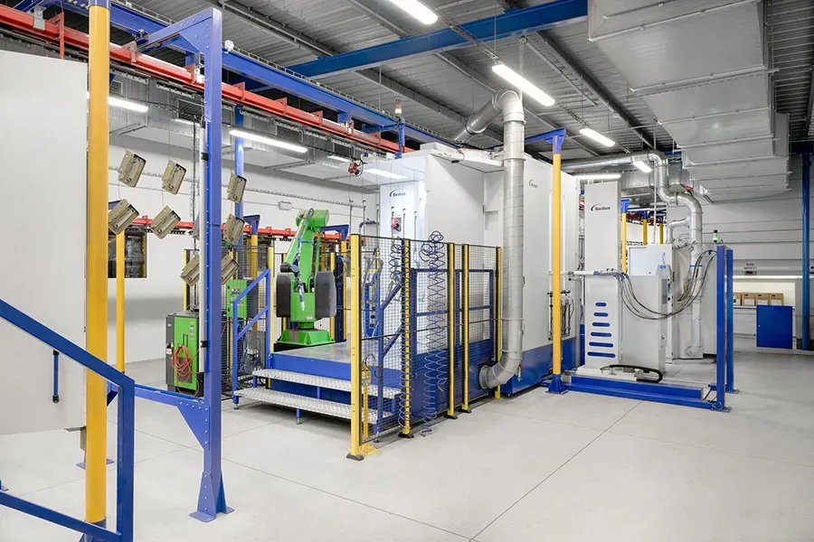 Powder coating line with robotic application