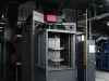 Blasting machine with dual blasting wheels
