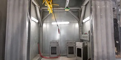 Cleaning booth for parts after blasting