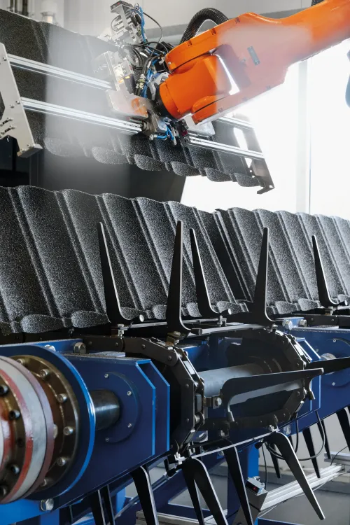 Metal roof tiles exiting drying oven