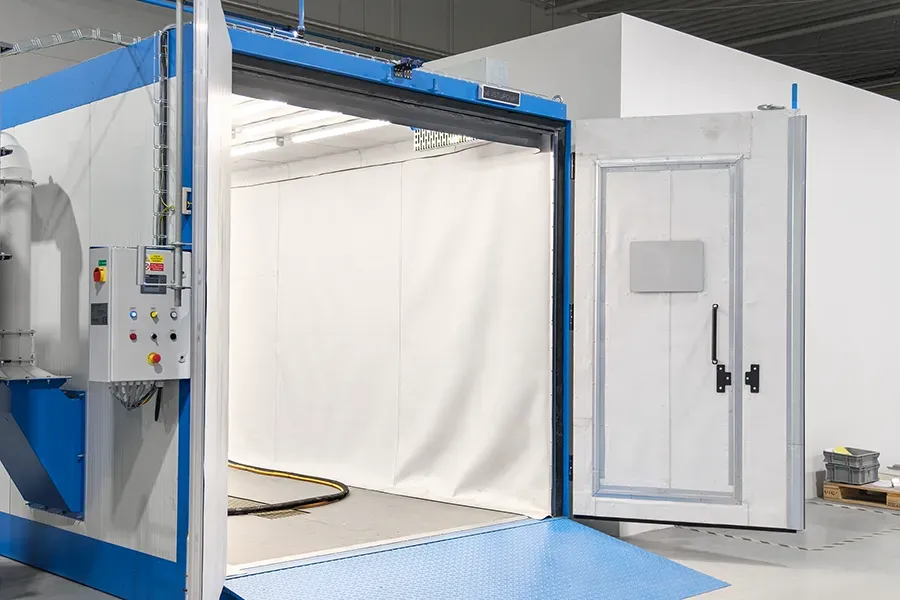 Compact blasting booth part entrance