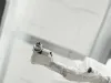 High pressure wet application nozzle close-up