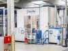 Robotic coating station