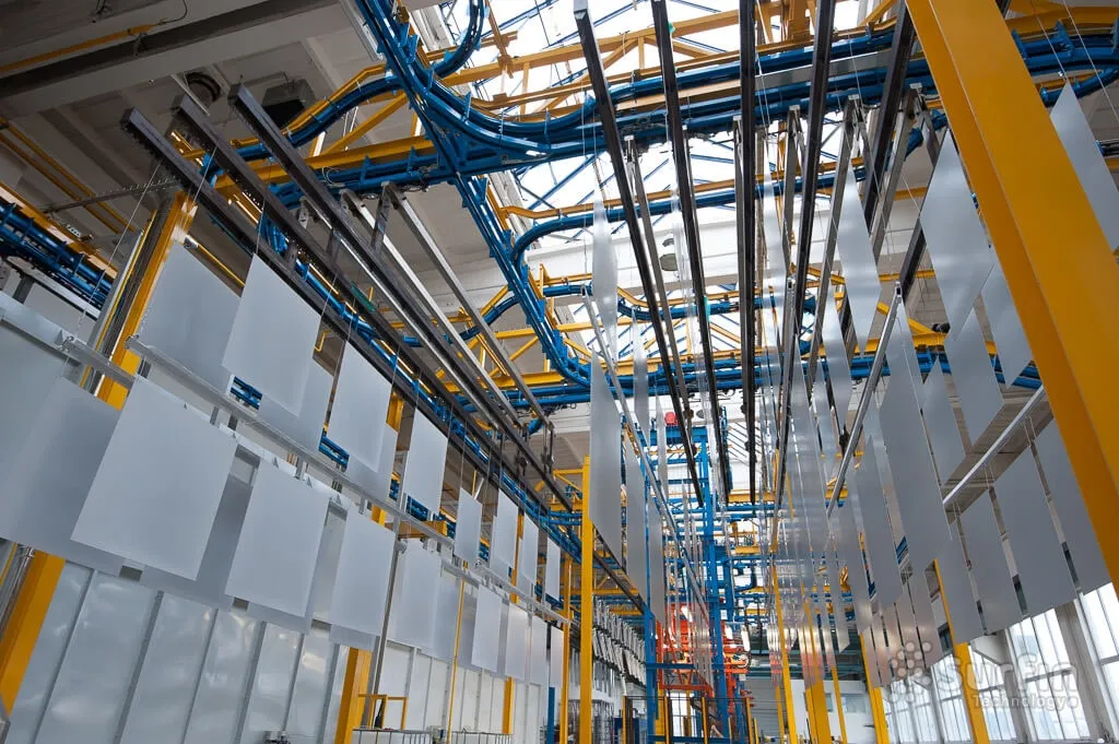 Parts hanging on overhead conveyor