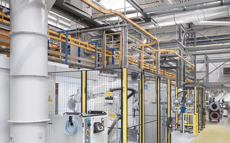 Robotic coating station