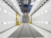 Robotic coating line loading station