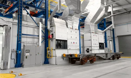 Robotic coating line for up to 25 m long freight wagons
