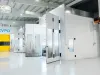Dual wet coating booths with doors open