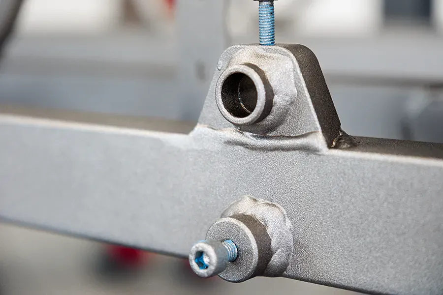 Metal part with screw after blasting