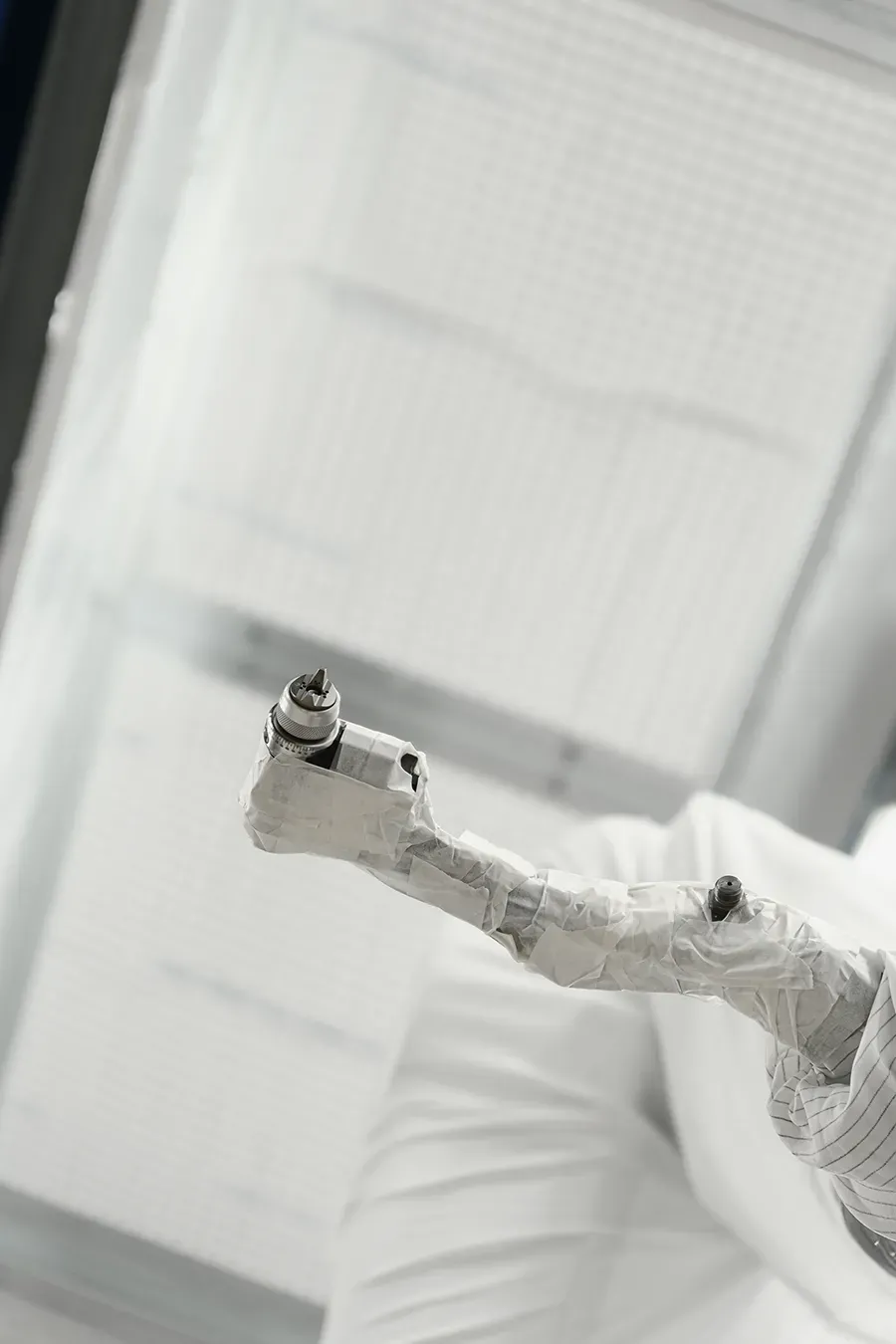High pressure wet application nozzle close-up