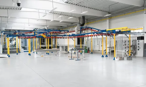 Economic powder coating line with automated application