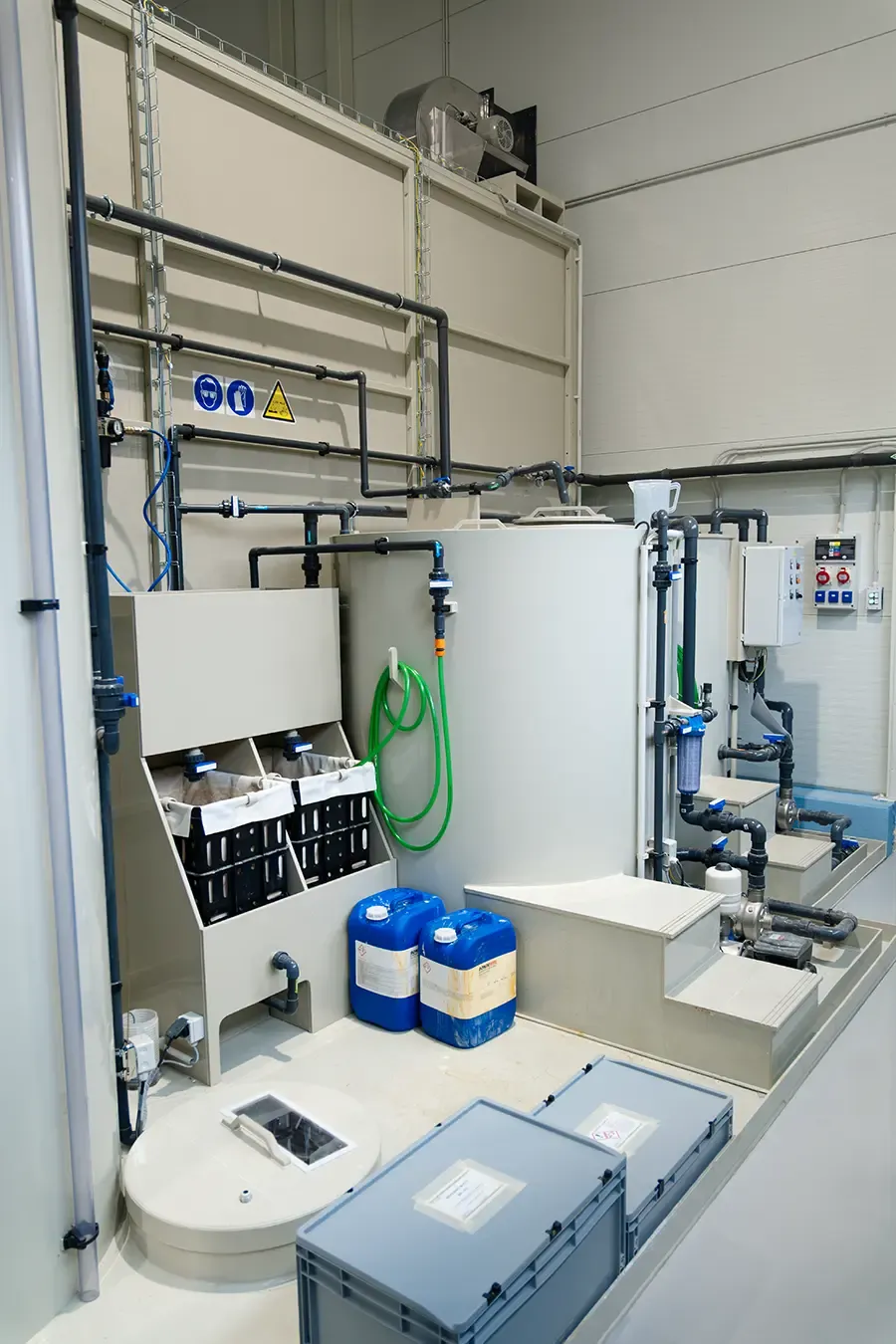 Washing booth process and storage tanks